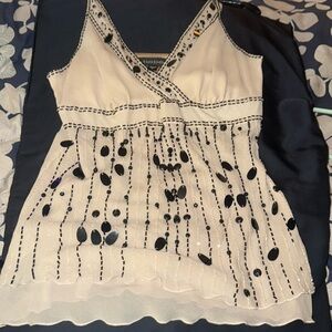 Bebe tank top. New with tags. Size Medium.